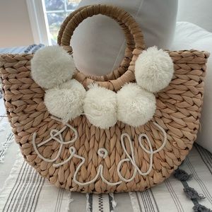 Very nicely made/quality bride bag with pom poms
